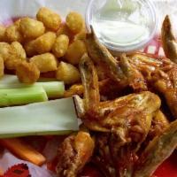 Wings · Whole Wings with a half order of fries or tots plus a dipping sauce
