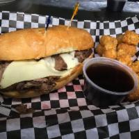 French Dip Sandwich · Roast beef, melted Swiss, onions, and with au jus.