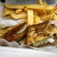 The Patty Melt Burger · Swiss on rye with sauteed onions.