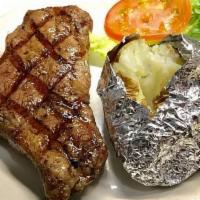 New York Strip · Chargrilled, black Angus steak cooked to your liking. Served with salad and your choice of s...