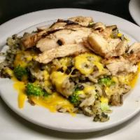 23. Wild Rice · Marinated chicken, Cheddar, and broccoli.