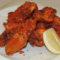 Hot Buffalo Wings · 7 pieces. Spicy chicken wings.