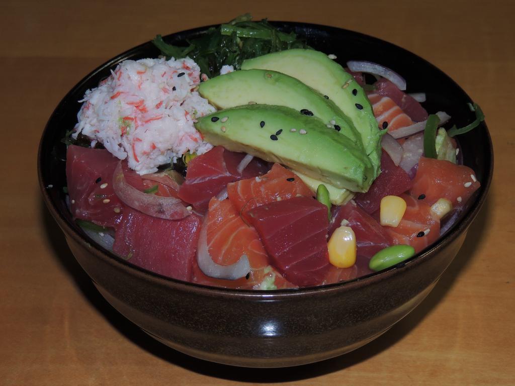 Gogo Poki · Spicy tuna, spicy salmon, red onion, cucumber, crab, seaweed salad, avocado, jalapeno, corn, edamame, sichimi and kaiware.