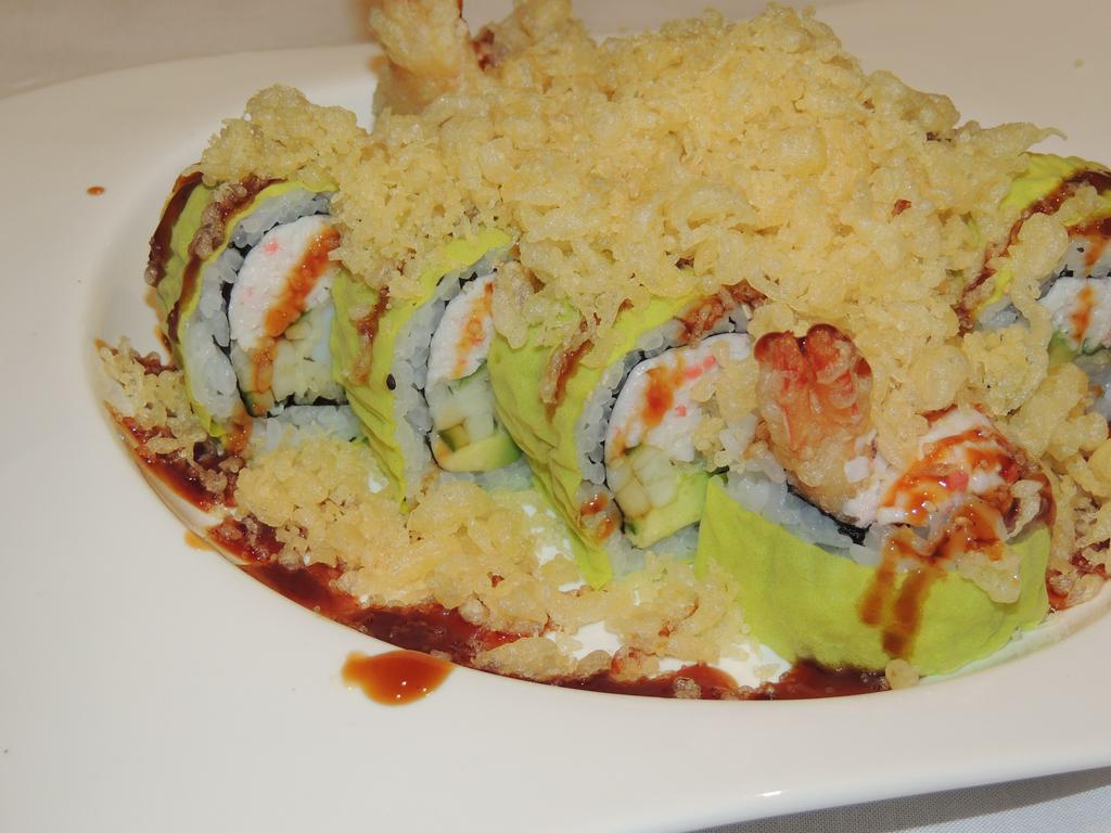 Crunch Roll · In: shrimp tempura, crab, avocado and cucumber. out: soy paper and tempura crunch.