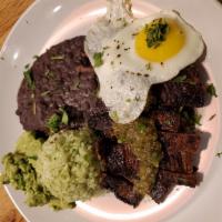 Grilled Skirt Steak · Rice, beans, fried egg, and chimichurri