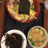 Oyako Donburi · Chicken, onion,  simmered in egg, served over rice, miso soup and konbu sanbaizuke.