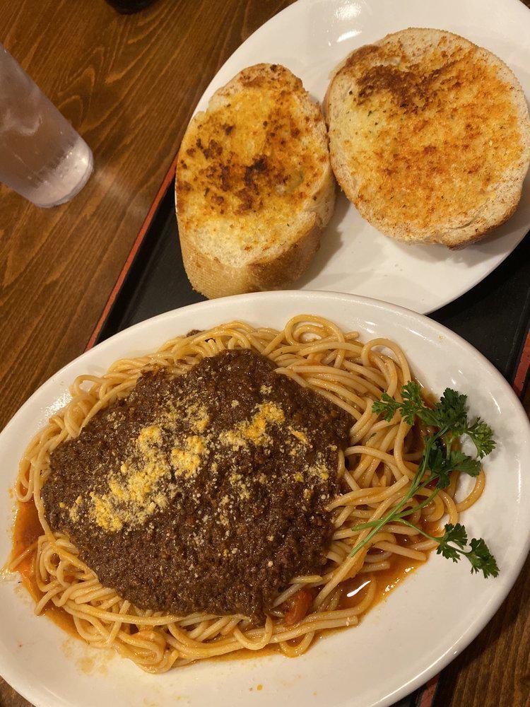 Spaghetti · Meat sauce, garlic bread.