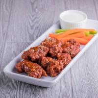 Boneless Wings · All white meat boneless wings tossed in 1 of our signature sauces, sprinkled with toasted se...