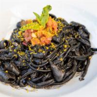 Tonnarelli  al Nero di Seppia Lunch · Fresh tonnarelli pasta with Monterey bay calamari, squid ink sauce, fresh Roma tomatoes, bas...