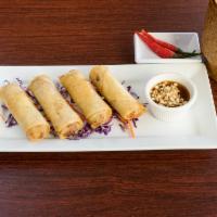 Lumpia Rolls · Handmade fried rolls with cabbage, carrots, pork, celery, noodles and onion. Served with swe...