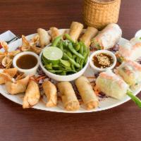 Mekong Sampler · 4 lumpia rolls, 4 mini spring rolls, 4 gyozas, 4 crab wontons and edamame  