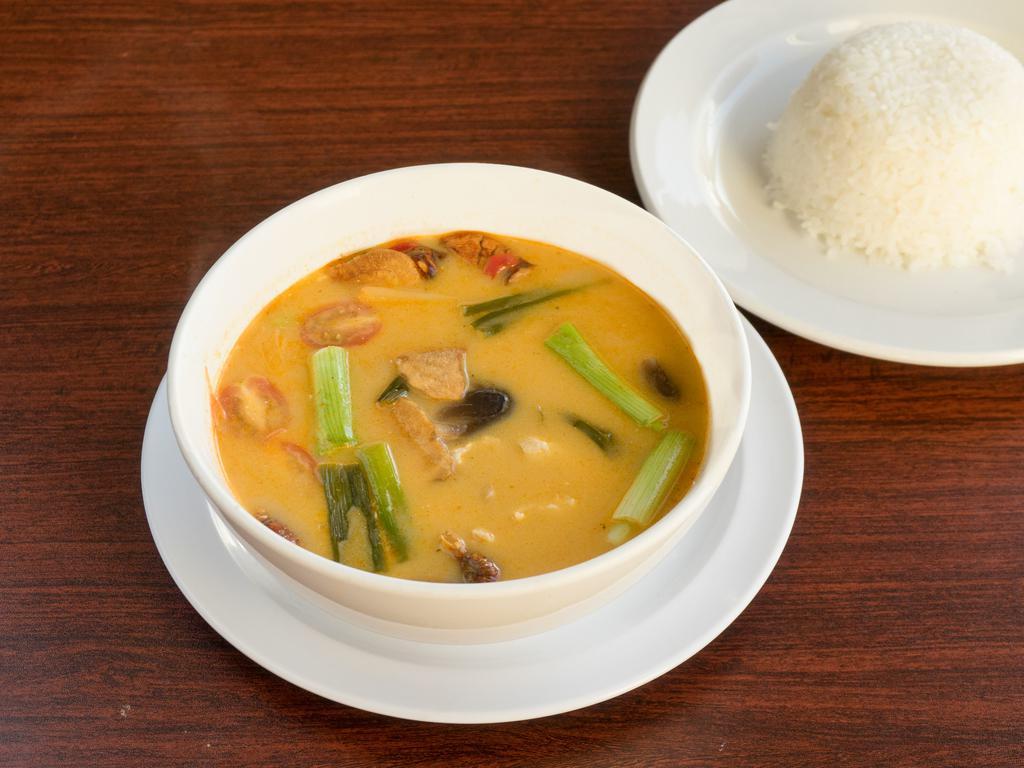 Thai Chicken Soup · Tom ka kai. Chicken, coconut milk, cherry tomato, lemongrass, mushrooms, galangal, green onion and lime juice. Served with steamed rice.
