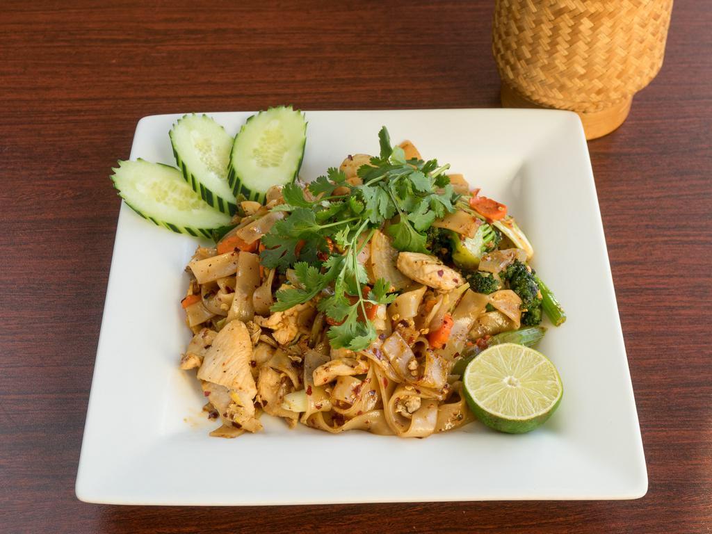 Pad See Ew Noodle · Stir fried rice noodles, egg, broccoli, celery, carrot, white and green onion, drenched in sweet soy sauce. Served with lime, cilantro and your choice of protein.