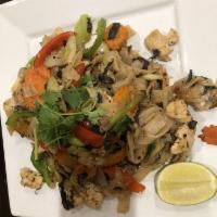 Drunken Noodles · Stir fried wide rice noodle, green and red bell peppers, white and green onions, celery, car...