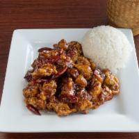 General Tso' Chicken · Deep fried battered chicken, coated with a sweet and spicy brown sauce. Served with steamed ...