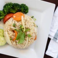 Classic Thai Fried Rice · Our special signature recipe for stir-fried jasmine rice with eggs, Chinese broccoli, onion ...