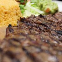 Carne Asada  · Served with rice, beans and pico de gallo.