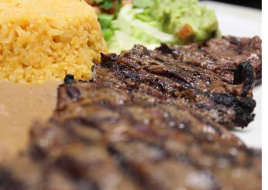 Carne Asada  · Served with rice, beans and pico de gallo.