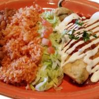 Chile Relleno Combo · 1 chile relleno with ranchero sauce and 1 enchilada. Includes rice and beans.