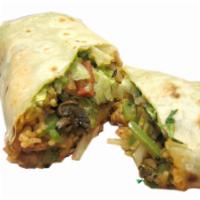 Veggie Burrito · Grilled peppers, onion, mushrooms, rice, pinto beans, lettuce, tomato, cheese and guacamole.