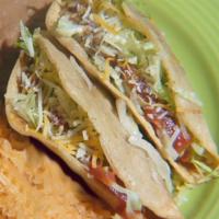 Single Taco Frito · Traditional fried taco with choice of meat, lettuce, cheese and taco sauce.
