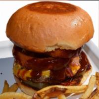 Cowboy Burger · Bacon and cheese with onion rings, BBQ sauce and pickles.