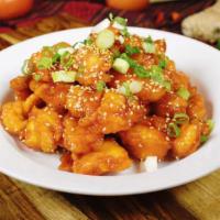 Orange Chicken · Deep fried chicken sauteed with sweet and tangy orange sauce
