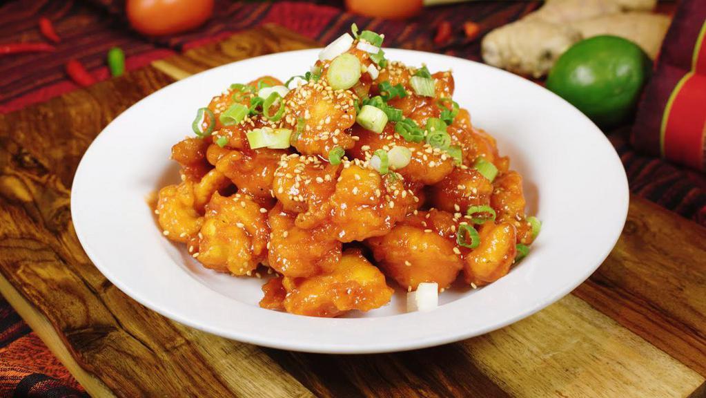 Orange Chicken · Deep fried chicken sauteed with sweet and tangy orange sauce