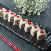 Winter Roll · Spicy crunch scallop inside, topped with white tuna, hot sauce and masago.