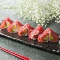 Valentine Roll · Spicy crunch tuna, avocado, mango, wrapped with soy bean paper and fresh tuna.