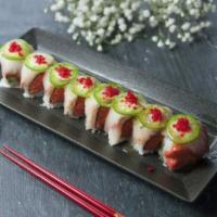 Secret Lover Roll · Spicy tuna, asparagus, top with yellowtail and jalapeno sauce and red tobiko. 