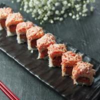 Dynamite Roll · Spicy crunch tuna, spicy salmon, topped with spicy kani salad and macadamia nut. 