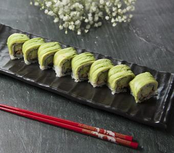 Dragon Roll · Eel, cucumber roll top with avocado. 