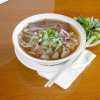 12. Pho Ha Long Bay Special · Rare eye round beef, brisket, meatball, tendon, and tripe.
