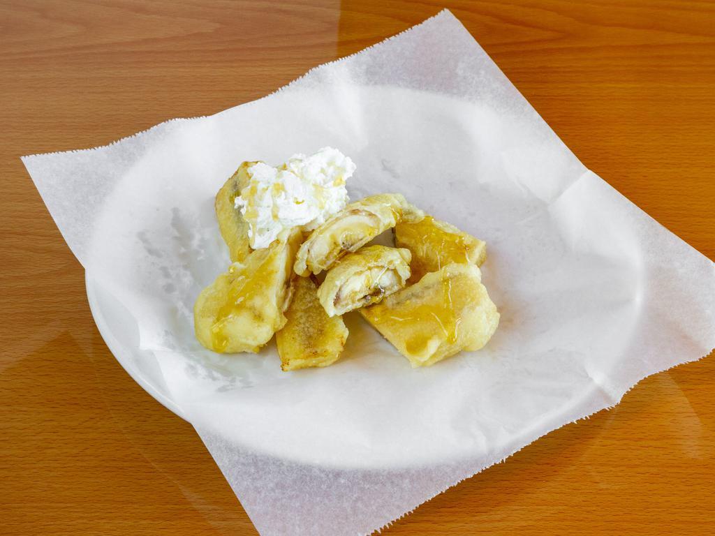 74. Fresh Fried Banana with Whipped Cream & Honey · Chuoi Chien.