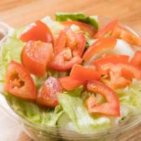 Green Salad · Mixed greens with tomatoes, cucumbers and red peppers.