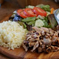 Chicken Shawarma Platter · Served with salad, pita bread and tzatziki sauce and choice of side.