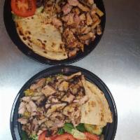 Chicken Shawarma Platter (Large) · Large - Served with salad, pita bread and tzatziki sauce and choice of rice or french fries.