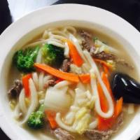 Beef Udon · Noodles with beef and vegetables in broth.