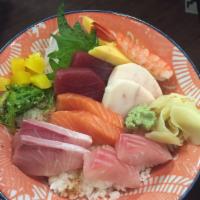 Chirashi Don · An assortment of gourmet sashimi over sushi rice. Served with salad and miso soup.