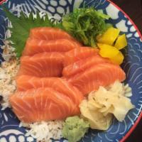 Sake Don · Sliced salmon sashimi over sushi rice. Served with salad and miso soup.