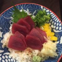Tekka Don · Sliced tuna sashimi over sushi rice. Served with salad and miso soup.