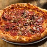 Upata Pizza · Pomodoro sauce, mozzarella cheese, ham, salami and mushrooms.
