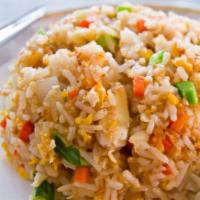 Crab fried rice · Fried rice with crab meat, egg, onion, green onion, pea, and carrot, cilantro, cucumber, and...