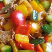 Sweet & Sour · Stir-fried with pineapple, tomatoes, onions, cucumber, carrot, bell pepper in sweet & sour s...