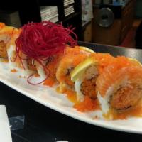 Dance with Salmon Roll · Salmon, avocado, masago on top of spicy crab roll, served with Midori sauce. Raw. Spicy.