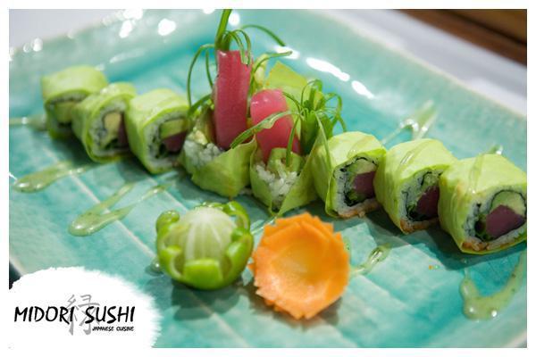 Paradise Roll · Fresh tuna, avocado, scallion inside, and wrapped in rice paper, served with sweet wasabi sauce. Raw.