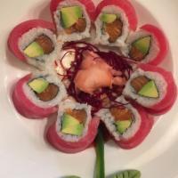 Cherry Blossom Roll · Fresh salmon and avocado inside wrapped with fresh tuna, served with Japanese mustard sauce....