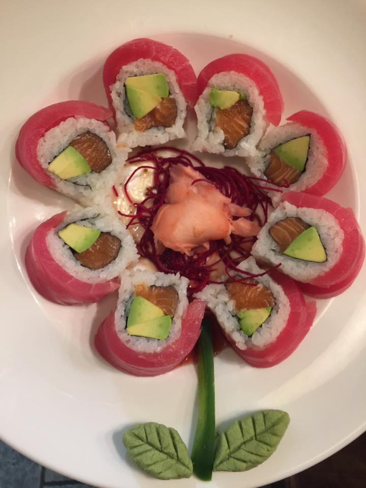 Cherry Blossom Roll · Fresh salmon and avocado inside wrapped with fresh tuna, served with Japanese mustard sauce. Raw.