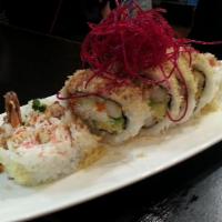 Crunch Shrimp Tempura Roll · Shrimp tempura, crab meat, avocado, cucumber, masago, and radish sprout inside tempura flake...